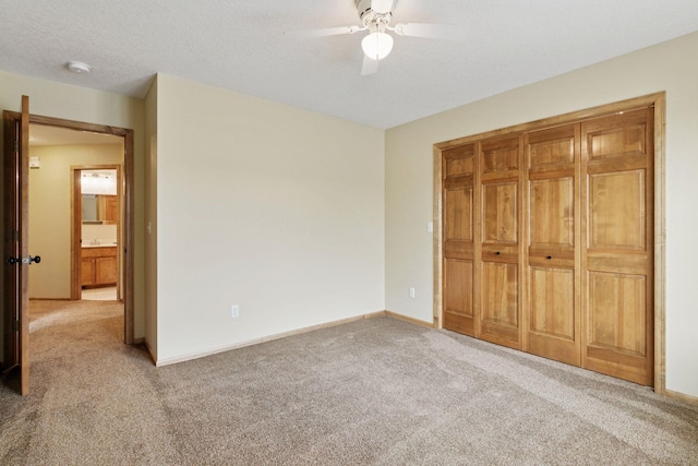 4633 Stonecliffe Dr, Eagan, MN 55122 - unfurnished bedroom featuring carpet, baseboards, and ceiling fan