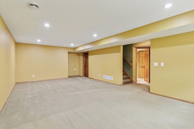 4633 Stonecliffe Dr, Eagan, MN 55122 - finished basement featuring recessed lighting, light colored carpet, stairway, and baseboards