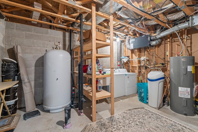 utilities with electric water heater, gas water heater, and washer and clothes dryer