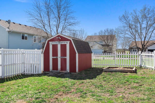 view of shed featuring a fenced backyard