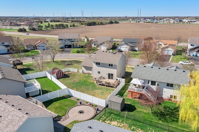 birds eye view of property with a residential view