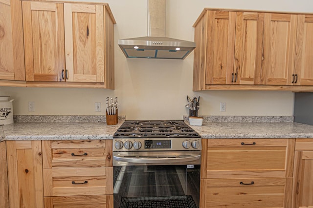 20462 Little Alps Rd NW, Evansville, MN 56326 - kitchen featuring stainless steel gas range, wall chimney range hood, and light brown cabinets