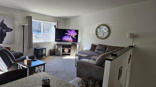 carpeted living room featuring a wood stove