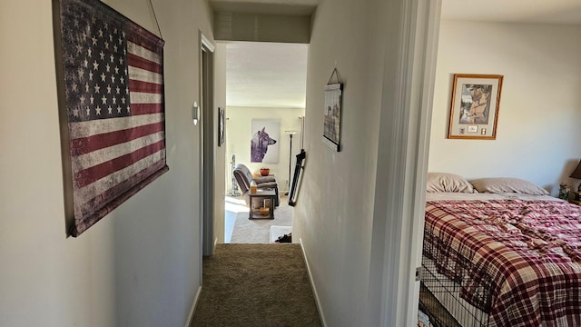 hallway with carpet