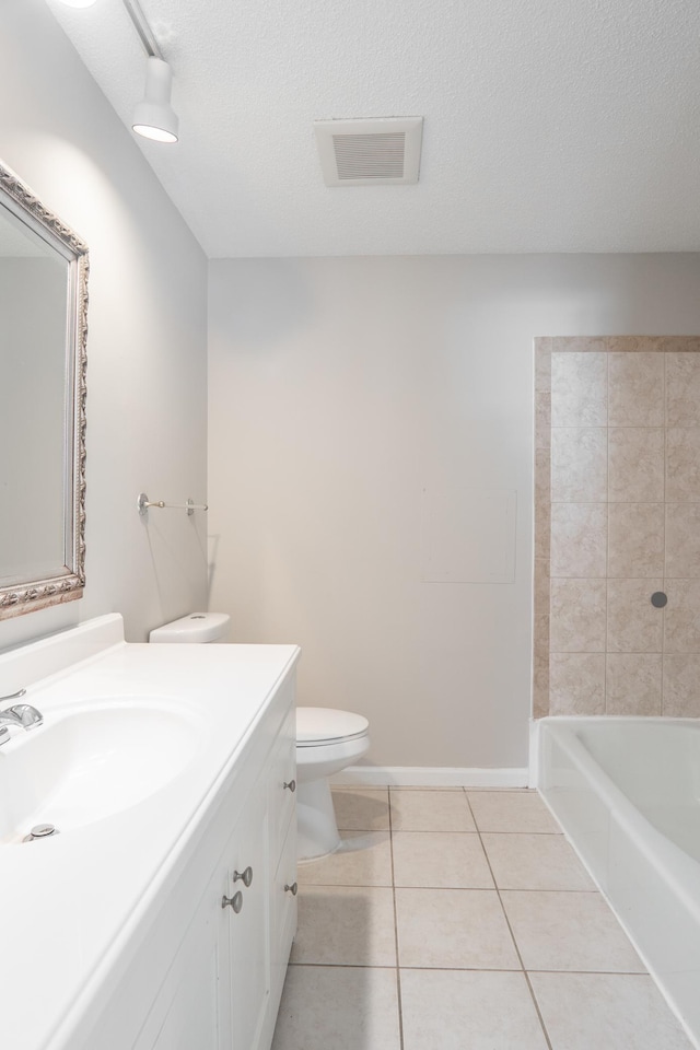 13100 Thomas Ave S, Burnsville, MN 55337 - bathroom with vanity, tile patterned flooring, and a textured ceiling