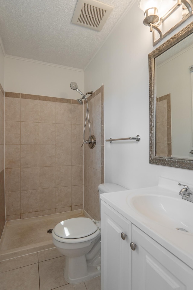 13100 Thomas Ave S, Burnsville, MN 55337 - full bath featuring vanity, a textured ceiling, a tile shower, tile patterned flooring, and crown molding