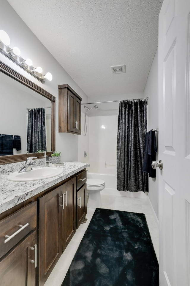 bathroom with shower / bath combo, a textured ceiling, visible vents, toilet, and vanity