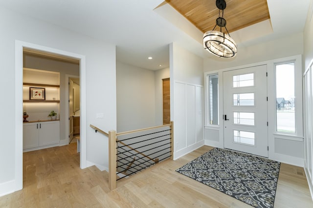3251 Century Ridge Pl NE, Rochester, MN 55906 - foyer entrance with light wood finished floors, a chandelier, baseboards, and recessed lighting