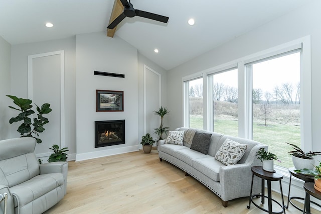 3251 Century Ridge Pl NE, Rochester, MN 55906 - living room featuring baseboards, a glass covered fireplace, light wood finished floors, recessed lighting, and a ceiling fan
