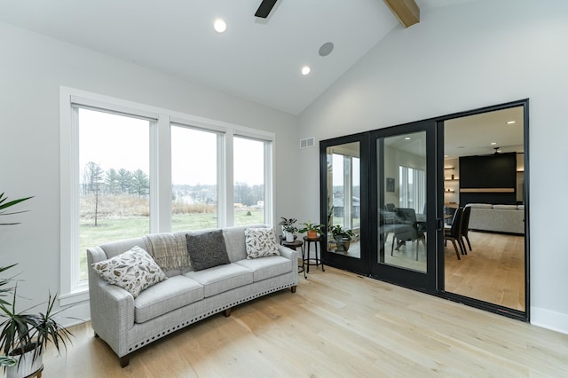 3251 Century Ridge Pl NE, Rochester, MN 55906 - living room with beam ceiling, healthy amount of natural light, light wood-type flooring, high vaulted ceiling, and recessed lighting
