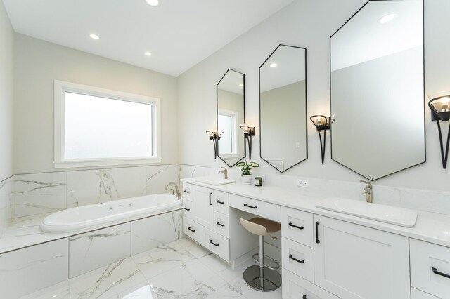 3251 Century Ridge Pl NE, Rochester, MN 55906 - bathroom with marble finish floors, double vanity, a garden tub, and recessed lighting