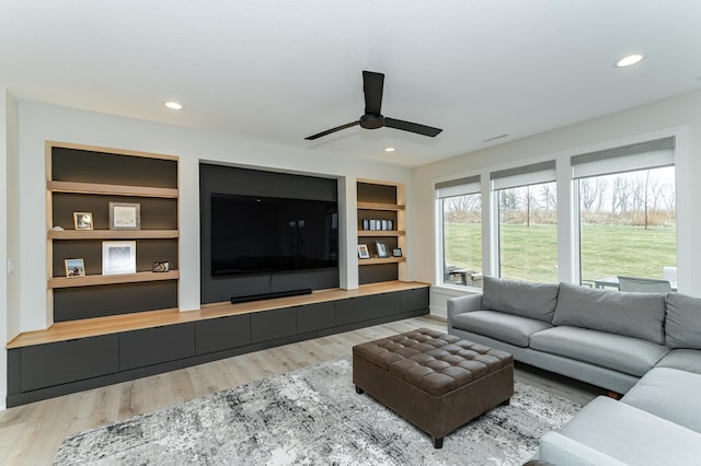 3251 Century Ridge Pl NE, Rochester, MN 55906 - living area featuring ceiling fan, wood finished floors, built in shelves, and recessed lighting
