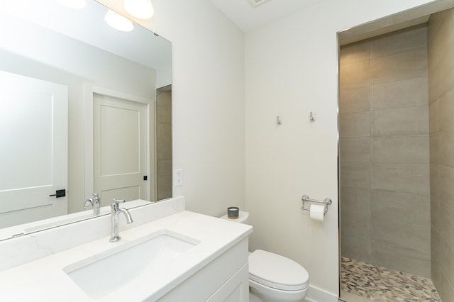 3251 Century Ridge Pl NE, Rochester, MN 55906 - full bathroom featuring vanity, toilet, and tiled shower