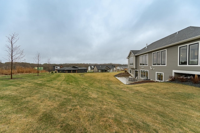 3251 Century Ridge Pl NE, Rochester, MN 55906 - view of grassy yard featuring a patio
