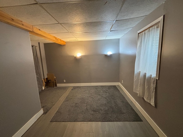 1017 Prairie St, Lake City, MN 55041 - spare room with a drop ceiling, baseboards, and wood finished floors