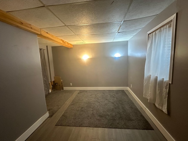 1017 Prairie St, Lake City, MN 55041 - empty room featuring baseboards, wood finished floors, and a paneled ceiling