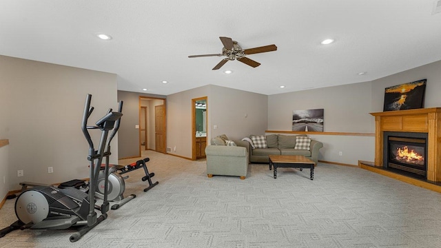 exercise area with recessed lighting, ceiling fan, and light carpet