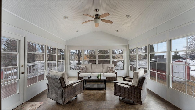 sunroom / solarium featuring an outdoor living space, ceiling fan, vaulted ceiling, and plenty of natural light