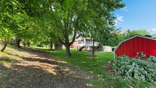 328 5th Ave S, Sartell, MN 56377 - view of grassy yard featuring a storage shed and stairs