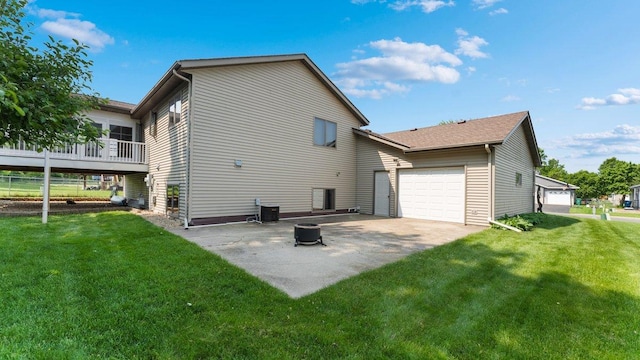 328 5th Ave S, Sartell, MN 56377 - rear view of house featuring a yard, an attached garage, and a patio area