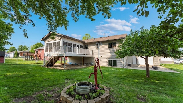 328 5th Ave S, Sartell, MN 56377 - back of house featuring stairs, a sunroom, a patio, and a yard