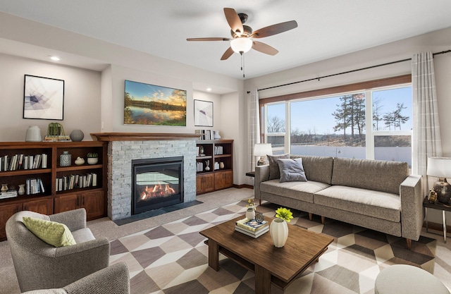 27290 Petes Hill Trl, Elko New Market, MN 55020 - living area with a stone fireplace and ceiling fan