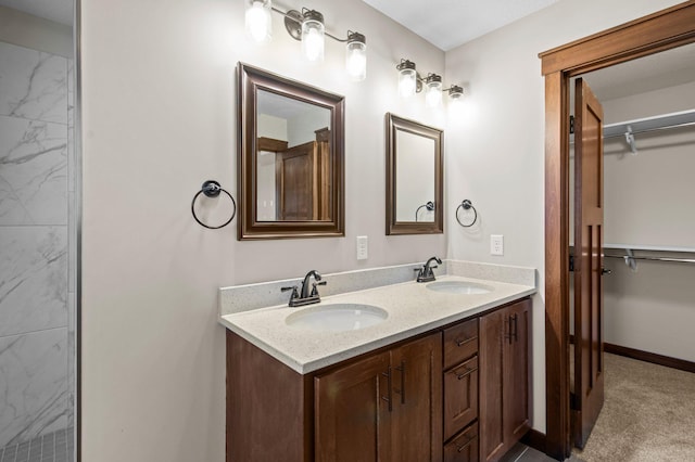 27290 Petes Hill Trl, Elko New Market, MN 55020 - full bath featuring double vanity, a sink, a spacious closet, and baseboards