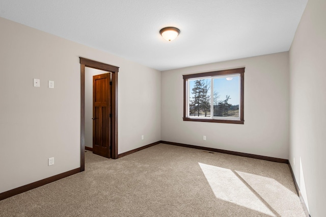 27290 Petes Hill Trl, Elko New Market, MN 55020 - unfurnished room featuring light carpet and baseboards