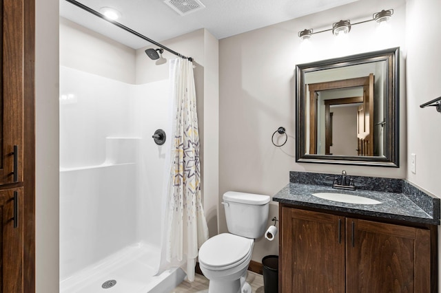 27290 Petes Hill Trl, Elko New Market, MN 55020 - bathroom featuring toilet, vanity, a shower stall, and visible vents