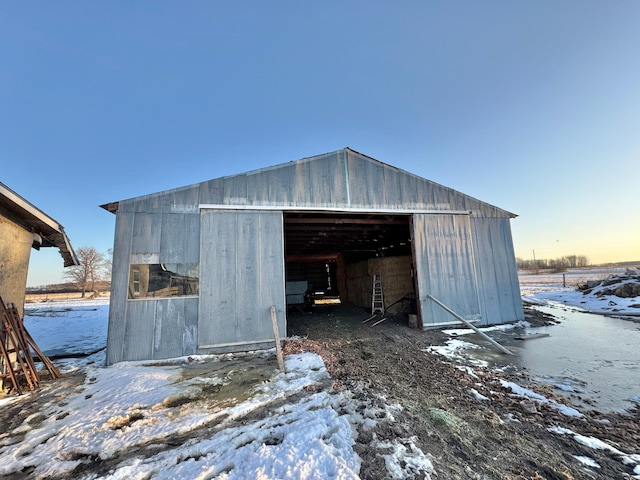 43091 Co Highway 75, Wadena, MN 56482 - snow covered structure featuring a pole building and an outbuilding