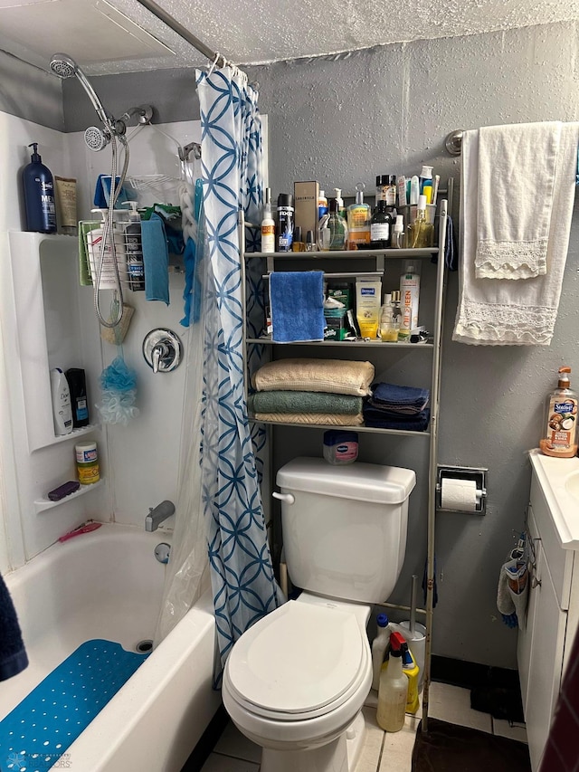 full bathroom with a textured wall, vanity, shower / bath combination with curtain, and toilet
