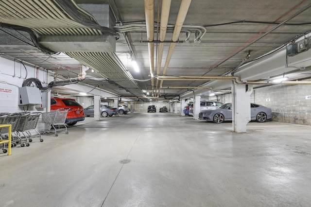 2800 Hillsboro Ave N Unit 220, New Hope, MN 55427 - parking deck featuring a garage door opener