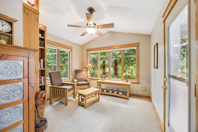 5475 Oakgreen Pl N, Oak Park Heights, MN 55082 - living area with vaulted ceiling, healthy amount of natural light, carpet, and ceiling fan