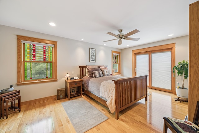 5475 Oakgreen Pl N, Oak Park Heights, MN 55082 - bedroom featuring light wood-style floors, access to exterior, recessed lighting, and ceiling fan