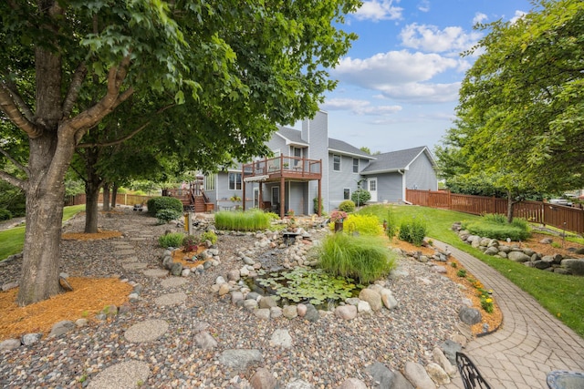5475 Oakgreen Pl N, Oak Park Heights, MN 55082 - view of yard featuring a wooden deck and stairs