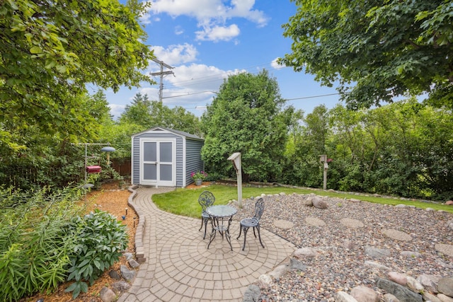 5475 Oakgreen Pl N, Oak Park Heights, MN 55082 - view of patio with a storage shed