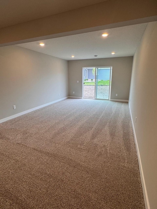 9829 89th St S, Cottage Grove, MN 55016 - spare room featuring carpet, recessed lighting, and baseboards