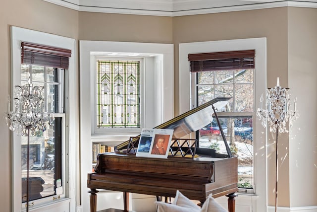 sitting room with a chandelier and a healthy amount of sunlight