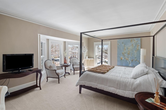 bedroom featuring ornamental molding and light colored carpet