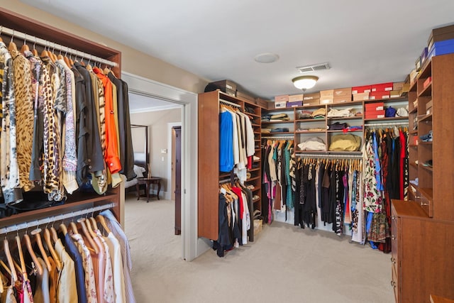 spacious closet with visible vents and light carpet