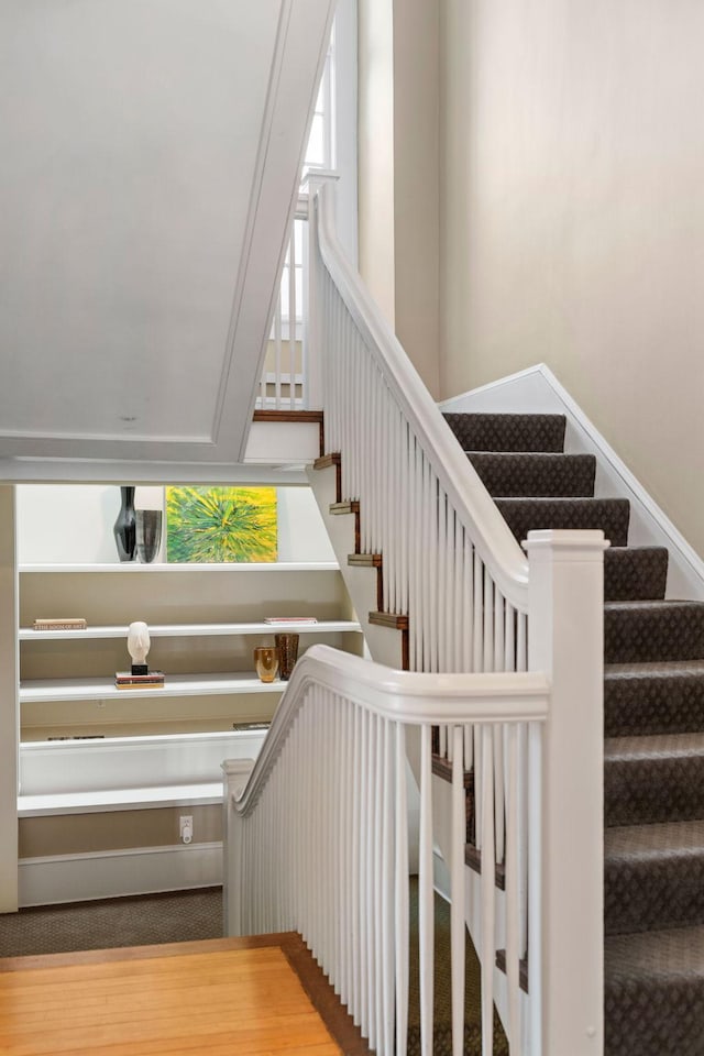 stairway featuring a healthy amount of sunlight