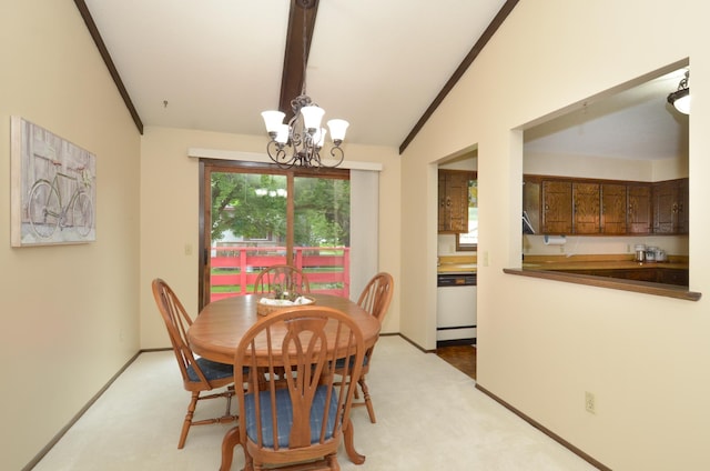 9805 Jackson St NE, Blaine, MN 55434 - dining area featuring a chandelier, carpet floors, and baseboards