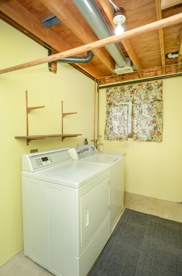 9805 Jackson St NE, Blaine, MN 55434 - laundry area featuring washer and clothes dryer