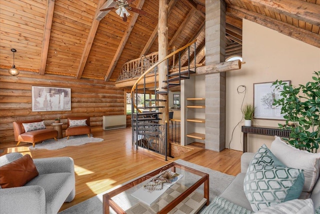 1100 155th St, Garfield Twp, WI 54001 - living room with wooden ceiling, log walls, beam ceiling, high vaulted ceiling, and wood finished floors