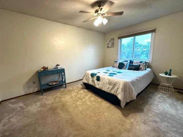 11620 Oregon Ave N, Champlin, MN 55316 - carpeted bedroom featuring ceiling fan