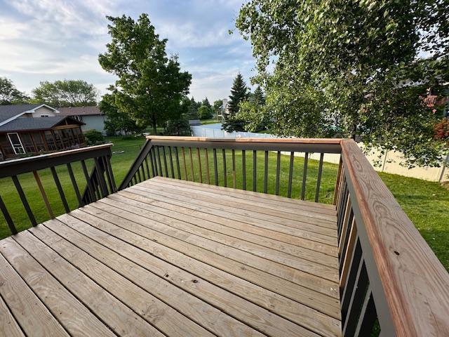 11620 Oregon Ave N, Champlin, MN 55316 - wooden terrace featuring a yard