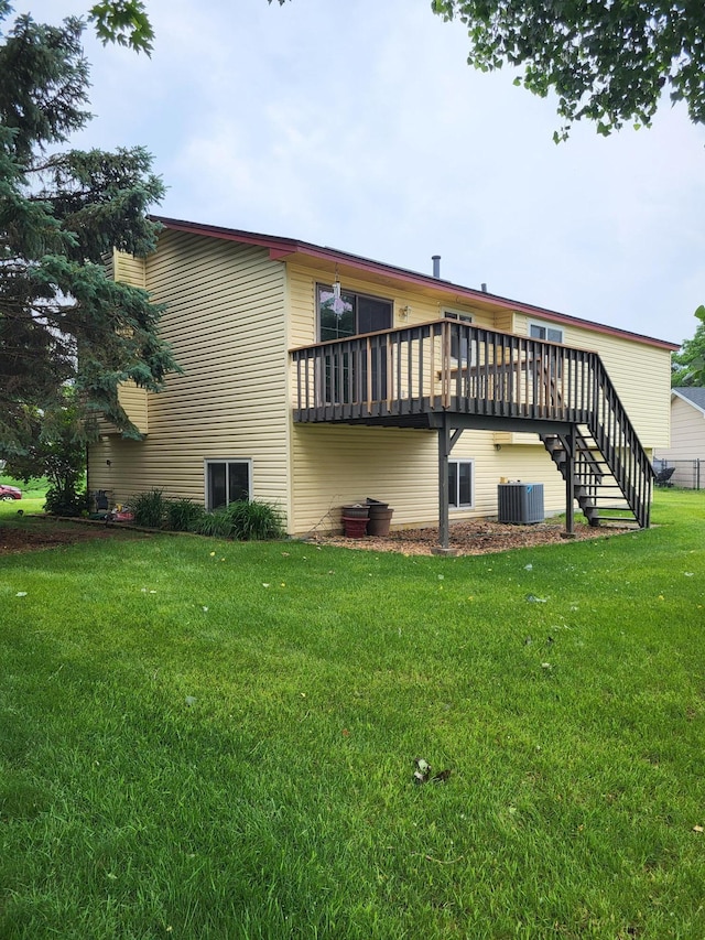 11620 Oregon Ave N, Champlin, MN 55316 - rear view of property with a lawn, a wooden deck, and stairway