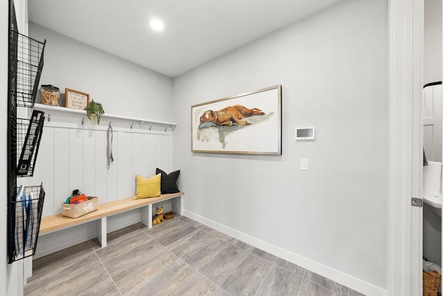 mudroom featuring baseboards