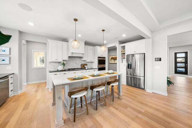 2712 Kensington Ave NE, Saint Michael, MN 55376 - kitchen with stainless steel appliances, white cabinets, baseboards, and recessed lighting