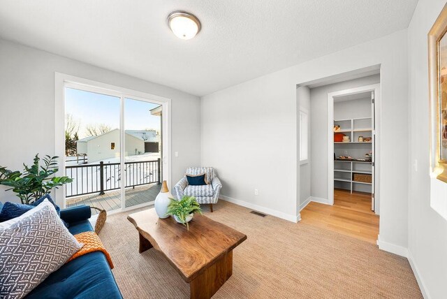 2712 Kensington Ave NE, Saint Michael, MN 55376 - living room with light colored carpet and baseboards